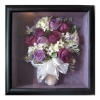 lavender roses and freesia with white hydrangea and stephanotis in a hand-tied bouquet
